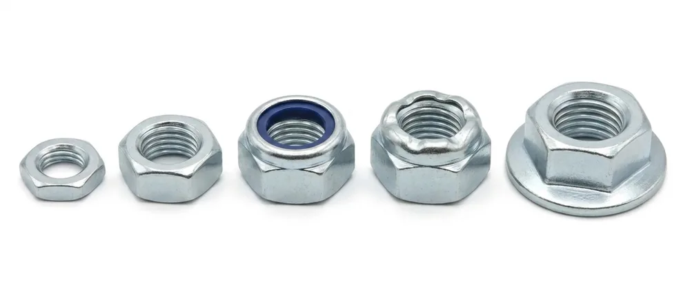 Five zinc plated hexagon nuts side by side on white: thin, full, nyloc with its nylon collar, Stover with a crimped crown, and flange